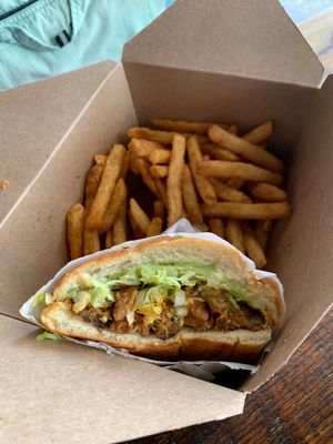 Fajita torta with fries  at Nuno's Tacos & Vegmex Grill in Dallas