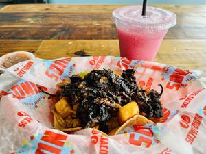 Hibiscus flower Barbacoa breakfast taco  at Nuno's Tacos & Vegmex Grill in Dallas
