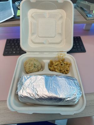 Vegan big Texas burrito with Mac n cheese and potato saladd  at Nuno's Tacos & Vegmex Grill in Dallas