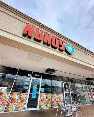 One of two outdoor tables (can’t eat inside)  at Nuno's Tacos & Vegmex Grill in Dallas