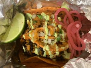 The Al Pastor and Barbacoa are both amazing  at Nuno's Tacos & Vegmex Grill in Dallas