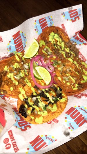 Huitlacoche, al pastor, bistec and chipotle chicken tacos.  at Nuno's Tacos & Vegmex Grill in Dallas