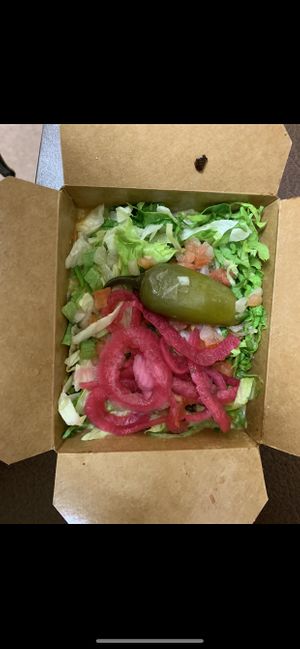 Nachos to go are build your own  at Nuno's Tacos & Vegmex Grill in Dallas