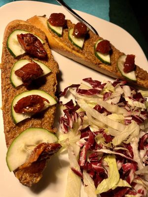 Bruschetta with olive pate, cucumber, and sun-dried tomato    at Timoleone Veggie Restaurant & Cocktail Bar in Taormina