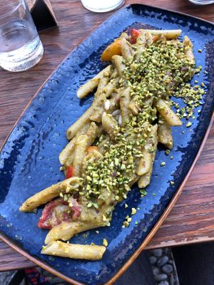 Local pistachio and cherry tomato pasta. Amazing! I accidentally ordered this one, and was so glad I did. Yum.  at Timoleone Veggie Restaurant & Cocktail Bar in Taormina