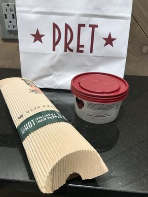 Falafel and red pepper hot wrap *contains cheese* at CLT - Pret A Manger - CC in Charlotte