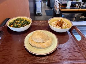 Kale salad, pizza pie, and German potato salad  at The Park Side Cafe in Olympia