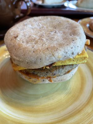 Breakfast sandwich with vegan cheese, sausage, egg on gluten free English muffins   at The Park Side Cafe in Olympia