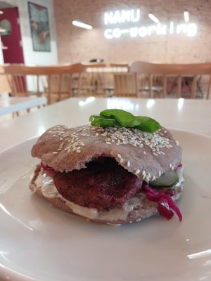 The Burger with Buckwheat patties, kimchi, cashew tahini dressing, mint and cucumber. Yum! So good at Namu ნამუ - Maybe closed in Tbilisi