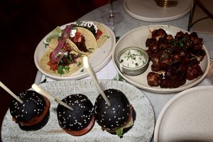 Sliders, tacos and popcorn cauliflower  at Eden in Bondi Beach