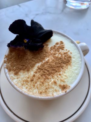 Sunshine turmerric latte with homemade oat milk at Eden in Bondi Beach