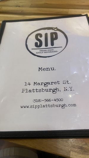 Front of menu  at Sip in Plattsburgh