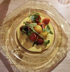 Blistered cherry tomatoes and corn  at Local Vegan in Seattle