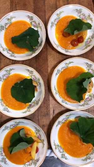 Tomato soup nasturtium  garnish  at Local Vegan in Seattle