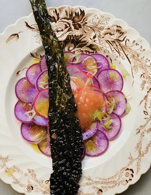 Ruskin radish carpaccio and quince preserves  at Local Vegan in Seattle