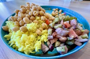Main dish of chickpeas over rice w/Shepherd salad    at Happy Vegans in Clifton