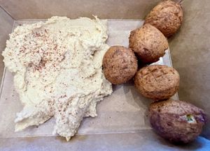 Falafel & hummus to go but I ended up eating the falafel and 1/2 hummus    at Happy Vegans in Clifton