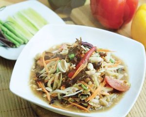 Papaya Salad (Som Tum), the signature Thai dish. at Khun Churn - Mediplex in Bangkok