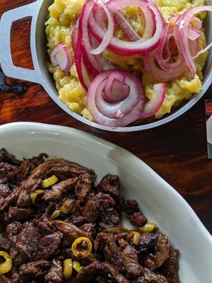 Veggie meats and side of mangú (mashed plantains with pickled onions) at Icelso in Lawrence