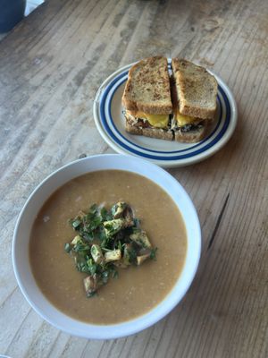 Vegan GF smoked tomato potato soup and vegan tempeh breakfast sandwich   at Wild Grocery & Cafe in Manzanita