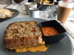 Grilled cheese and cappuccino for breakfast  at Vegan Inc in Puebla