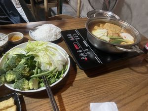 The hotpot ingredients and the soup (tomato)  at Ngon Vegan Restaurant in Tam Coc