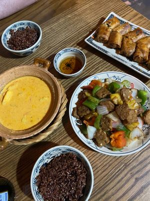 Coconut chickpea Curry, Tempeh and Peppers, Fried Spring Rolls and Rice at Ngon Vegan Restaurant in Tam Coc