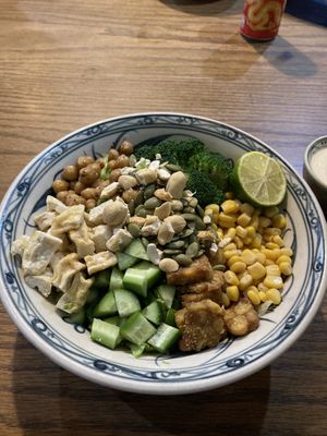 Bowl with tempeh, tofu, veg and tahini dressing   at Ngon Vegan Restaurant in Tam Coc