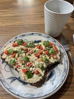 Hummus toast and vietnamese tea  at Ngon Vegan Restaurant in Tam Coc