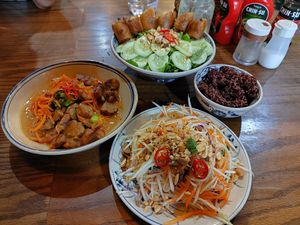 Papaya salad, tempeh and springrolls noodles at Ngon Vegan Restaurant in Tam Coc