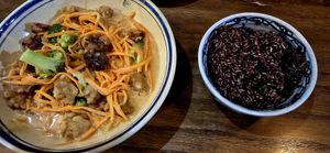 Tempeh with peanut ginger sauce and brown rice at Ngon Vegan Restaurant in Tam Coc