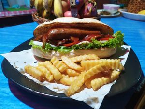 Vegan hotdog with the lot + fries at Happy Cup Restaurant in Pai