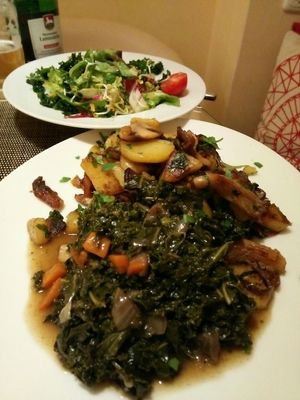 What a feast! Roasted potatoes with mushrooms and kale vegetables. Hearty, savoury and what a plate full! Bring some hunger! at Vinzenz in Weilheim
