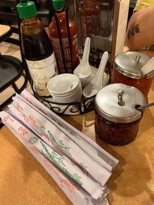 Sauces on table  at Noodle City in Goleta