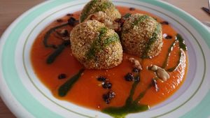 Seasonal dish, 15.50 euro: carrot puree, balls (made of rice, red lentils and onions) with raisins, green oil and more.  at Xuxu in Biarritz