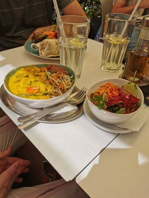 Curry of the day with brown rice and a side salad at The Heart of Joy in Salzburg
