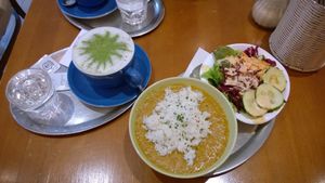 dahl, salad and matcha latte at The Heart of Joy in Salzburg