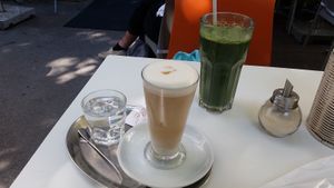 Latte Macchiato with Soy milk and a large green juice.  at The Heart of Joy in Salzburg