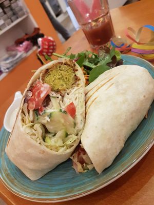 Falafel wrap with sidesalad and tahini dressing at The Heart of Joy in Salzburg