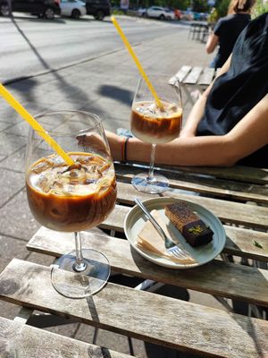Vegan bar and iced latte with coconut milk at Italala Caffe in Vilnius