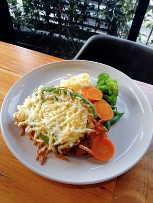 Vegan schnitzel with frenchy topping at The Nags Head Hotel in Adamstown