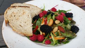 Salad with berries, nuts, lettuce and bread. at Het Arsenaal 1309 in Doesburg