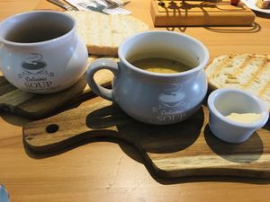 Homemade soup with cauliflower, turnip and courgette. A perfect combo of creamy purée and yet juicy at the same time! So delicious! Toasted sourdough was generous and wonderful  at Luna's Vegan Corner in Cardiff