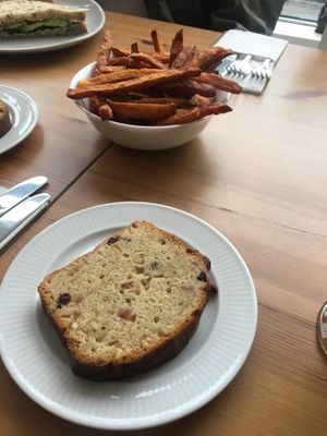 Cake of the day and sweet potato fries.   at Luna's Vegan Corner in Cardiff