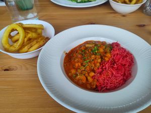 Tasty Stroganoff with oily onion rings at Luna's Vegan Corner in Cardiff