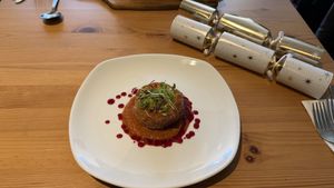 Vegetable Risotto Cake
Roasted Red Pepper, Smoked Aubergine Sauce,
Beetroot Glaze  at Luna's Vegan Corner in Cardiff