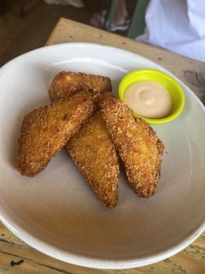 Vegan hash browns with vegan siracha Mayo  at Early Bird in Plymouth