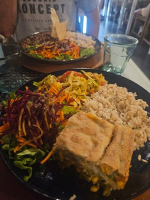 The large portion, brown rice, salad, vegetable pie. at Gosto Superior in Braga