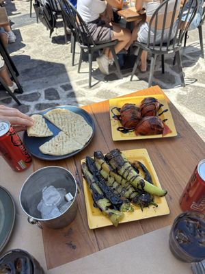 Grilled peppers, tomatoes and pita  at Allas Souvlaki & More in Paros
