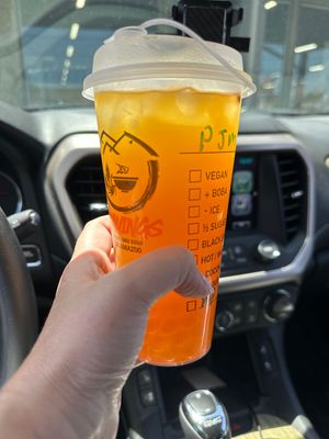 Passion mango tea with mango 🧋 boba  at Cravings Deli in Portage